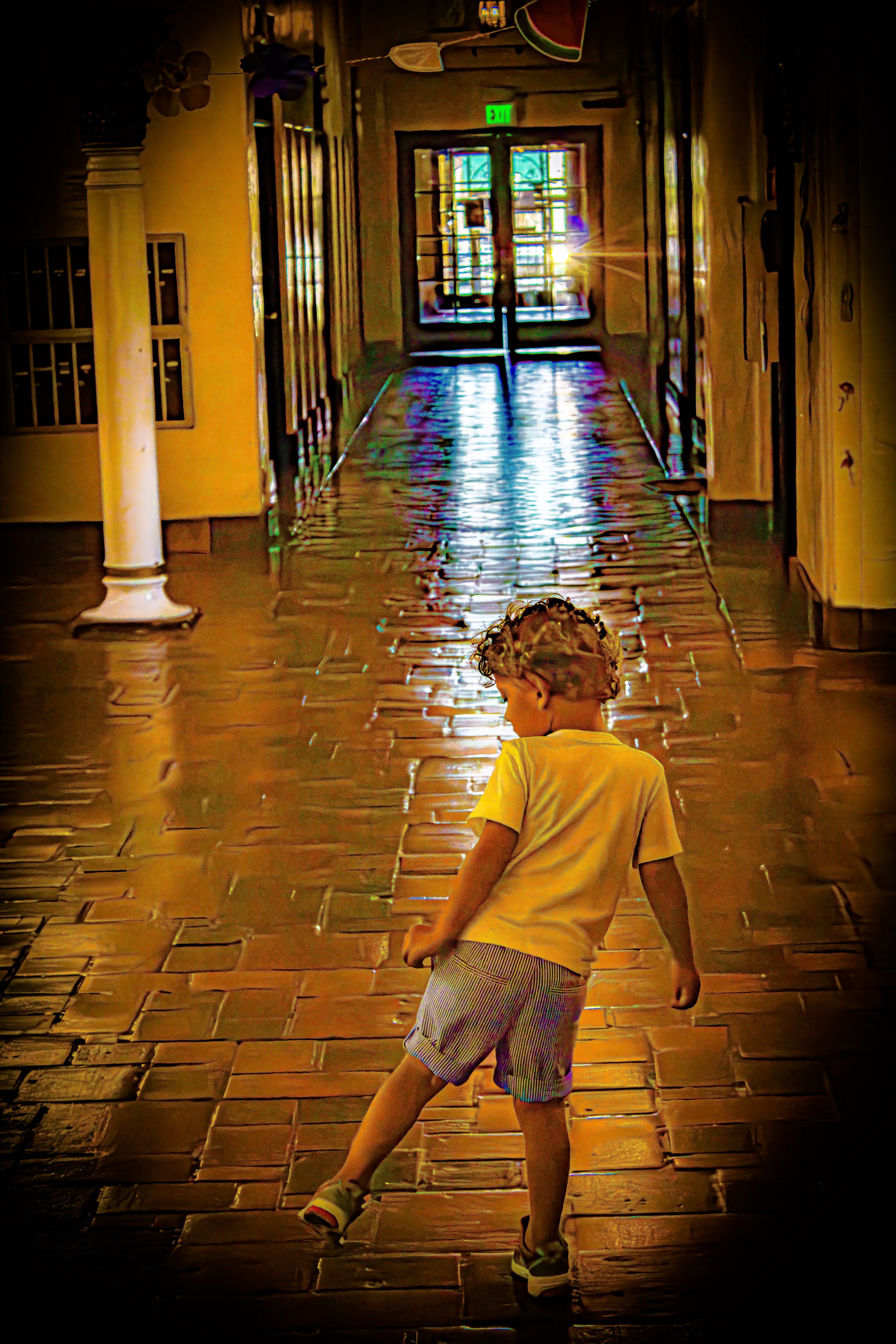 Young Son Playing at the Alameda Hotel and Apartments